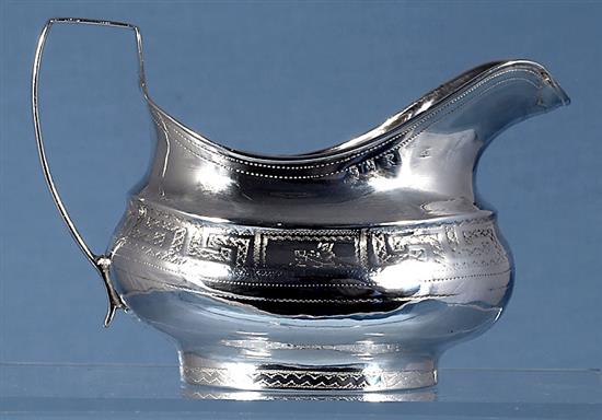 A George III Irish silver sugar bowl and cream jug, maker possibly Robert Breading, bowl length 210mm, weight 12oz/375grms.